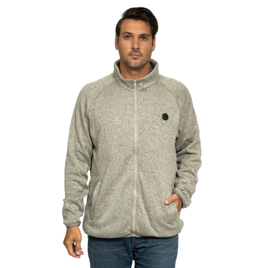 Man wearing a gray full-zip fleece jacket with a high collar and front pockets, standing against a black background.