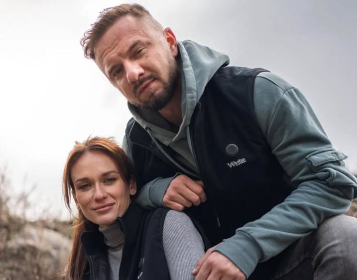 Couple wearing heated vests.